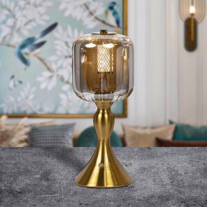 gold based lamp with grey glass shade
