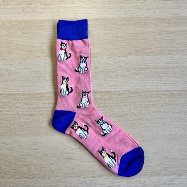 Sock Society pink socks with cats on them. Purple toe and heal